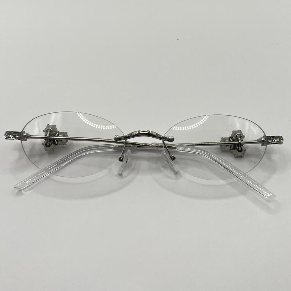 Gothic silver rimless glasses with